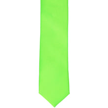 Load image into Gallery viewer, The front of a hot lime green skinny tie, laid flat