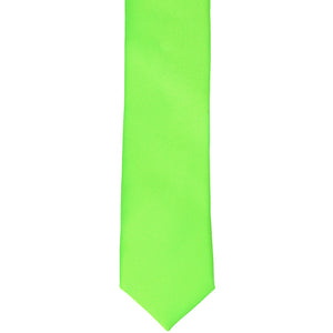 The front of a hot lime green skinny tie, laid flat