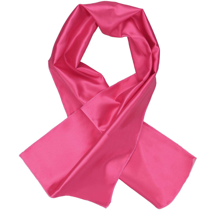 A women's hot pink solid scarf, laid out with one end over the other