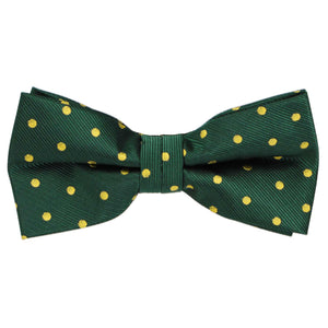 A hunter green and gold polka dot bow tie