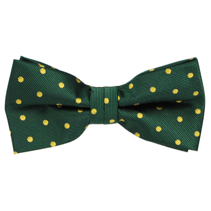 A hunter green and gold polka dot bow tie