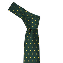 Load image into Gallery viewer, Knotted green tie with gold polka dots on a white background