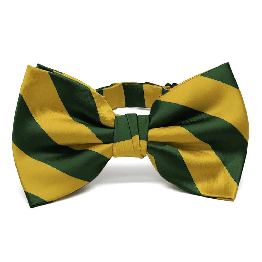 A hunter green and gold striped bow tie with the band collar secured in back