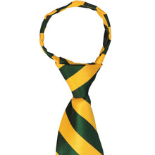 Load image into Gallery viewer, The knot on a hunter green and golden yellow striped zipper tie