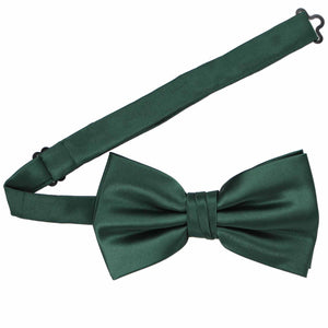 A large-size hunter green pre-tied bow tie with the band collar open