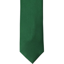 Load image into Gallery viewer, The front of a hunter green silk tie, laid out flat