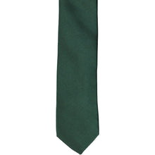 Load image into Gallery viewer, The front of a hunter green skinny tie, laid flat