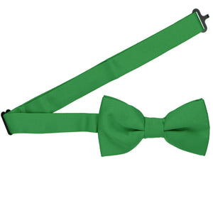 A pre-tied bow tie in irish green with the band collar open
