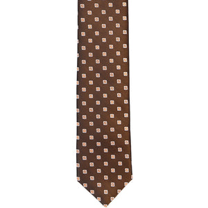 The front of an iridescent brown-orange skinny tie with a small square pattern, laid out flat