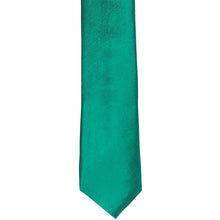 Load image into Gallery viewer, The front of a jade skinny tie, laid flat