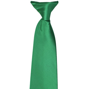 A closeup of the clip on a kelly green clip-on tie