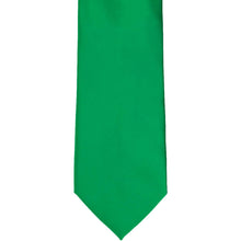 Load image into Gallery viewer, The bottom tip of a kelly green solid tie, laying flat
