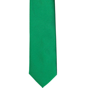 The front of a kelly green solid tie, laid out flat