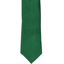 Load image into Gallery viewer, The front of a kelly green tone-on-tone slim tie, laid out flat