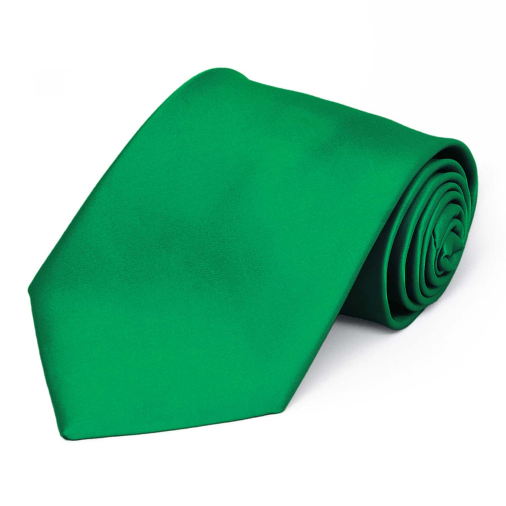 A kelly green solid tie, rolled to show off the front