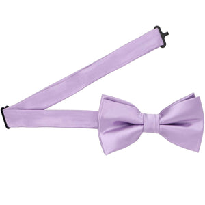 Pre-tied lavender bow tie with the band collar open