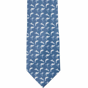 The front of a blue tie with white leaping rabbit, dolphin, frog and kangaroo silhouettes