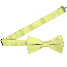Load image into Gallery viewer, A pre-tied bow tie in lemon lime with the band collar open