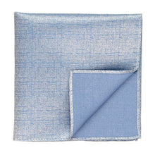 Load image into Gallery viewer, A folded light blue pocket square with a textured crosshatch weave, shown on a plain white background.