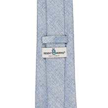 Load image into Gallery viewer, A light blue and white textured necktie with a crosshatch pattern, featuring a white Regent Morris Neckwear label at the center.