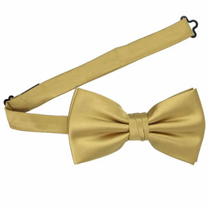 A light gold pre-tied bow tie with an unsecured band collar bow tie