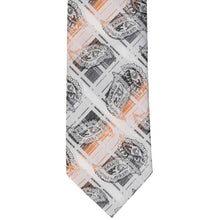 Load image into Gallery viewer, Patterned tie with black and orange paisley design on a white background
