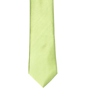The front of a lime green slim tie, laid out flat