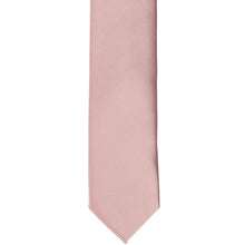 Load image into Gallery viewer, The front of a mauve skinny solid tie, laid flat