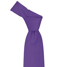 Load image into Gallery viewer, Tied knot on a medium purple solid tie