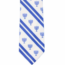 Load image into Gallery viewer, The front of a blue and white striped tie with a menorah pattern