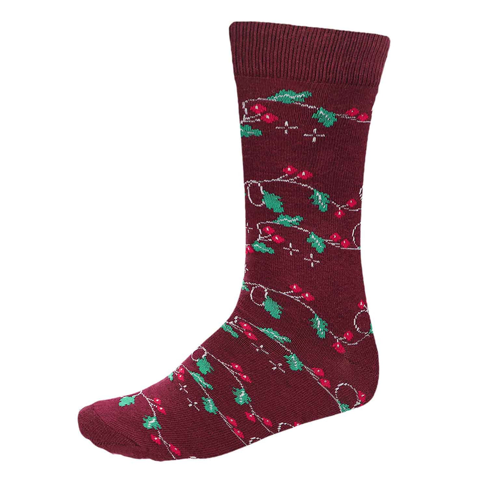 A men's burgundy sock with Christmas holly and berry pattern