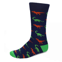 Load image into Gallery viewer, Men’s navy crew sock with orange T-Rex and green brontosaurus dinosaur pattern, novelty cotton sock