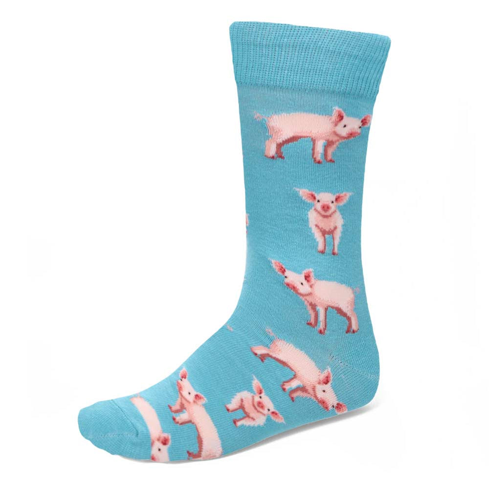 A blue men's sock with pink pigs