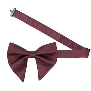 An oversized merlot teardrop bow tie with an open band collar