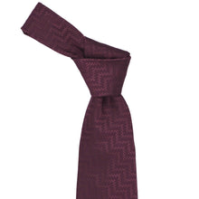 Load image into Gallery viewer, Knot on a woven merlot zig zag pattern necktie