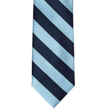 Load image into Gallery viewer, The front of a navy blue and light blue classic striped tie