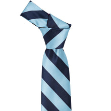Load image into Gallery viewer, Knot on a navy and light blue striped tie