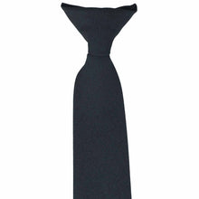 Load image into Gallery viewer, The top of a knot on navy blue clip-on uniform tie