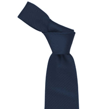 Load image into Gallery viewer, Knot on a navy blue herringbone necktie on a white background