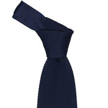 Load image into Gallery viewer, Knotted collar on a navy blue knit tie