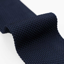 Load image into Gallery viewer, Close-up of a navy blue knitted tie on a white background