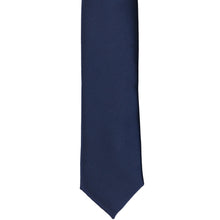 Load image into Gallery viewer, The front of a navy blue skinny tie