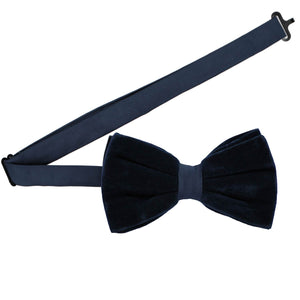 A pre-tied navy blue bow tie with the adjustable band collar spread out
