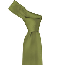 Load image into Gallery viewer, Close-up of a solid olive green necktie knot, highlighting the earthy green tone and subtle ribbed texture of the fabric