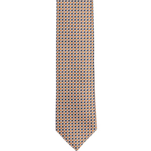 An orange and gray circle pattern skinny tie, laid out flat