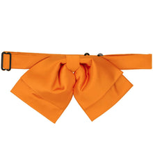 Load image into Gallery viewer, Bright orange pre-tied floppy bow tie with a matching adjustable band collar, displayed flat against a white background.