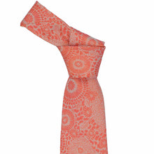 Load image into Gallery viewer, Tied knot on an orange floral knotted tie