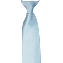 Load image into Gallery viewer, The knot on a pale blue clip-on tie, laid flat