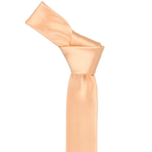 Load image into Gallery viewer, A peach skinny necktie with a knot at the top