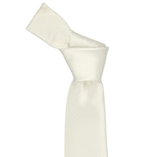 Load image into Gallery viewer, An off-white (pearl) textured herringbone necktie tied in a knot, shown against a solid white background.